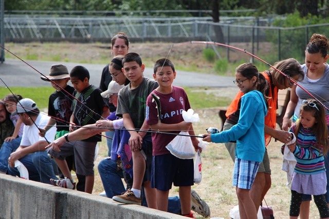 Many kids fishing.